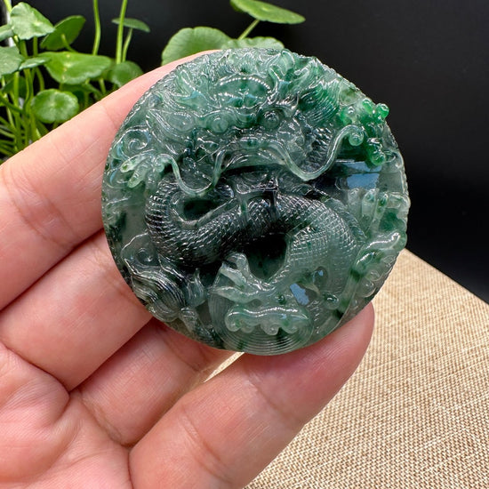 Celestial Majesty: The Unique Jadeite Jade Dragon Pendant by a Famous Master Carver