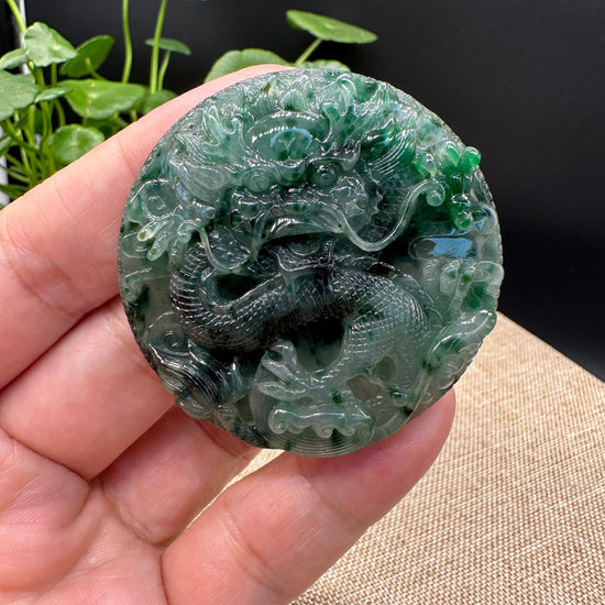 Celestial Majesty: The Unique Jadeite Jade Dragon Pendant by a Famous Master Carver