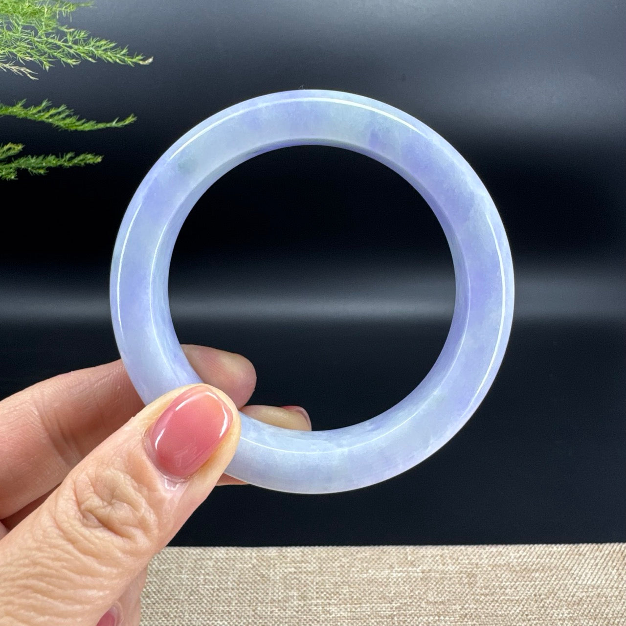 The bangle shape of the half round.The bangle color is lavender.