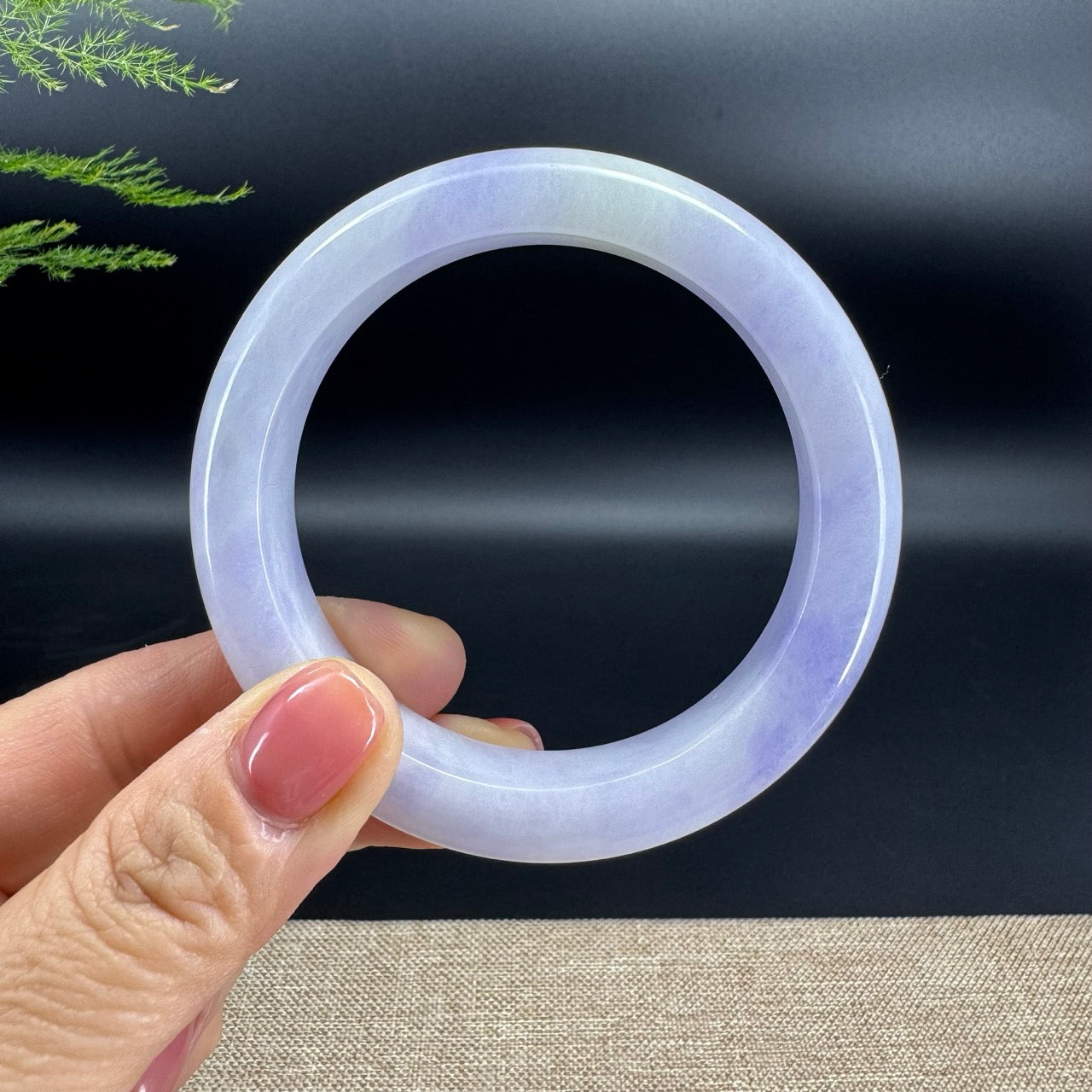 The bangle shape of the half round.The bangle color is lavender.