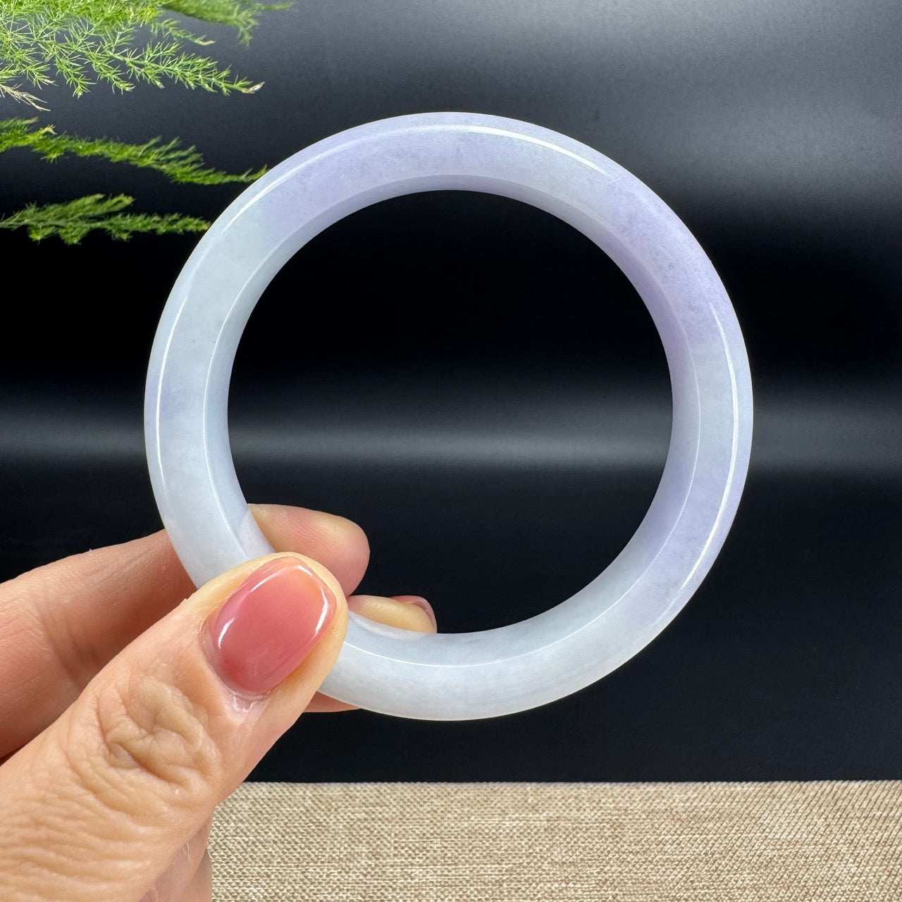 The bangle shape of the half round.The bangle color is icy lavender.