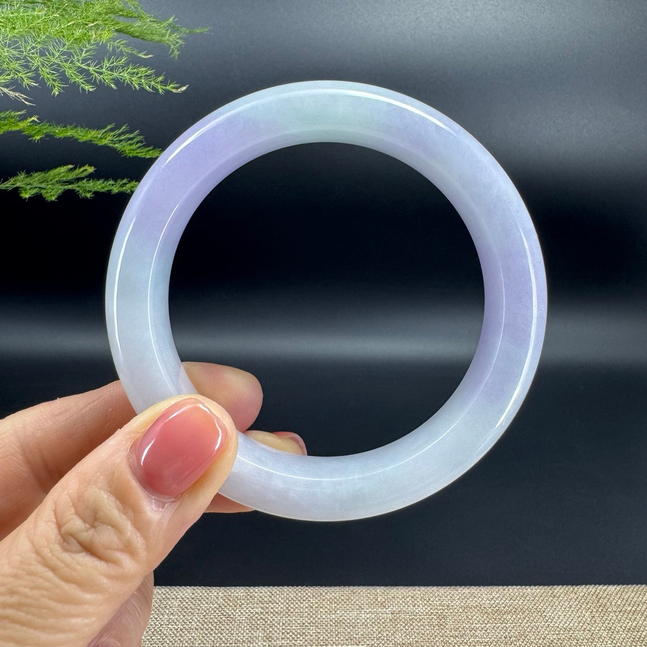 The bangle shape of the half round.The bangle color is lavender green.