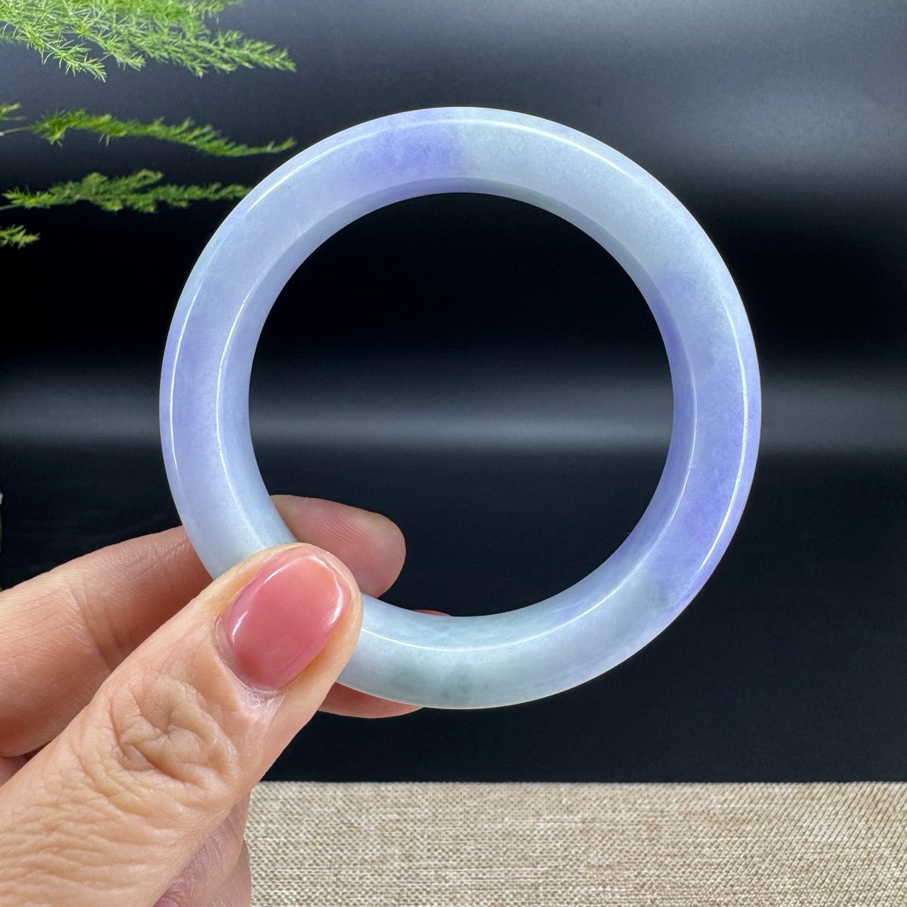 The bangle shape of the half round.The bangle color is lavender green.