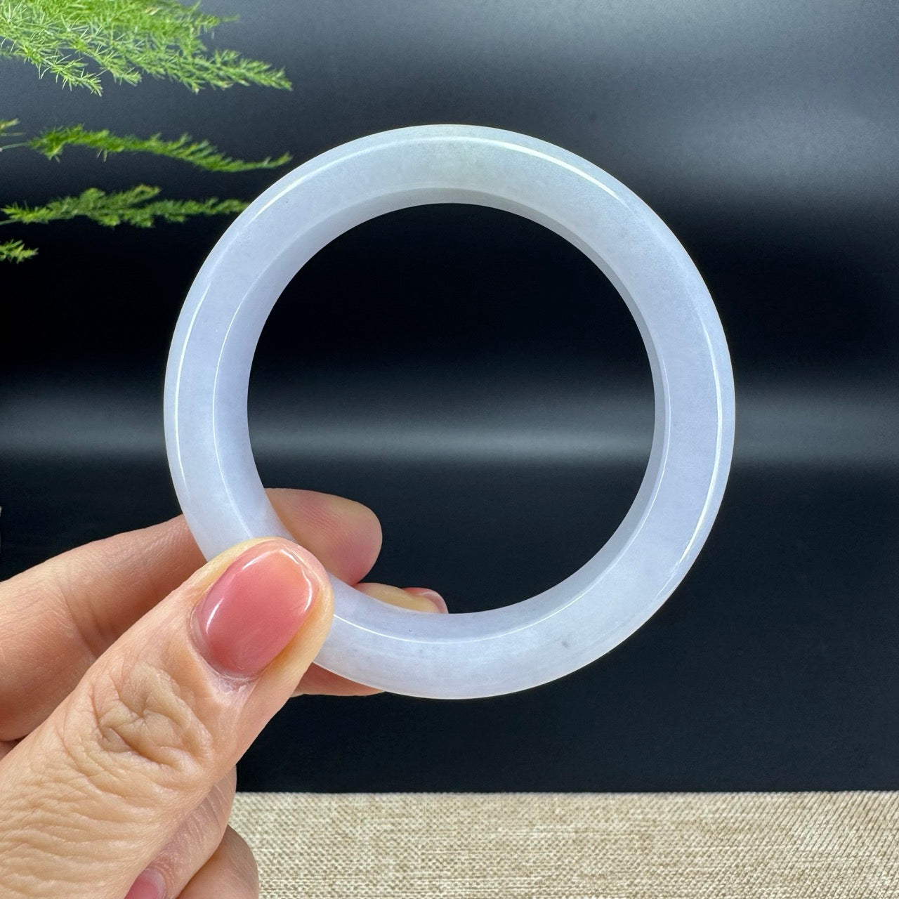 The bangle shape of the half round.The bangle color is lavender 