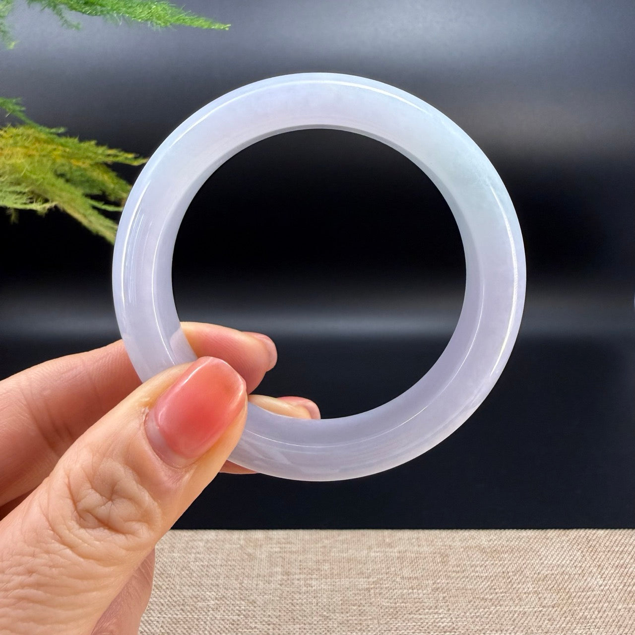 The bangle shape of the half round.The bangle color is icy lavender green.