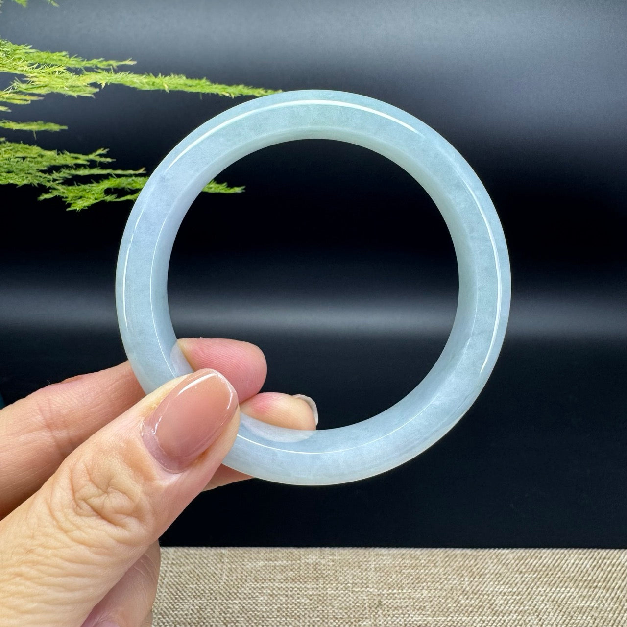 The bangle shape of the half round.The bangle color is icy lavender green. 