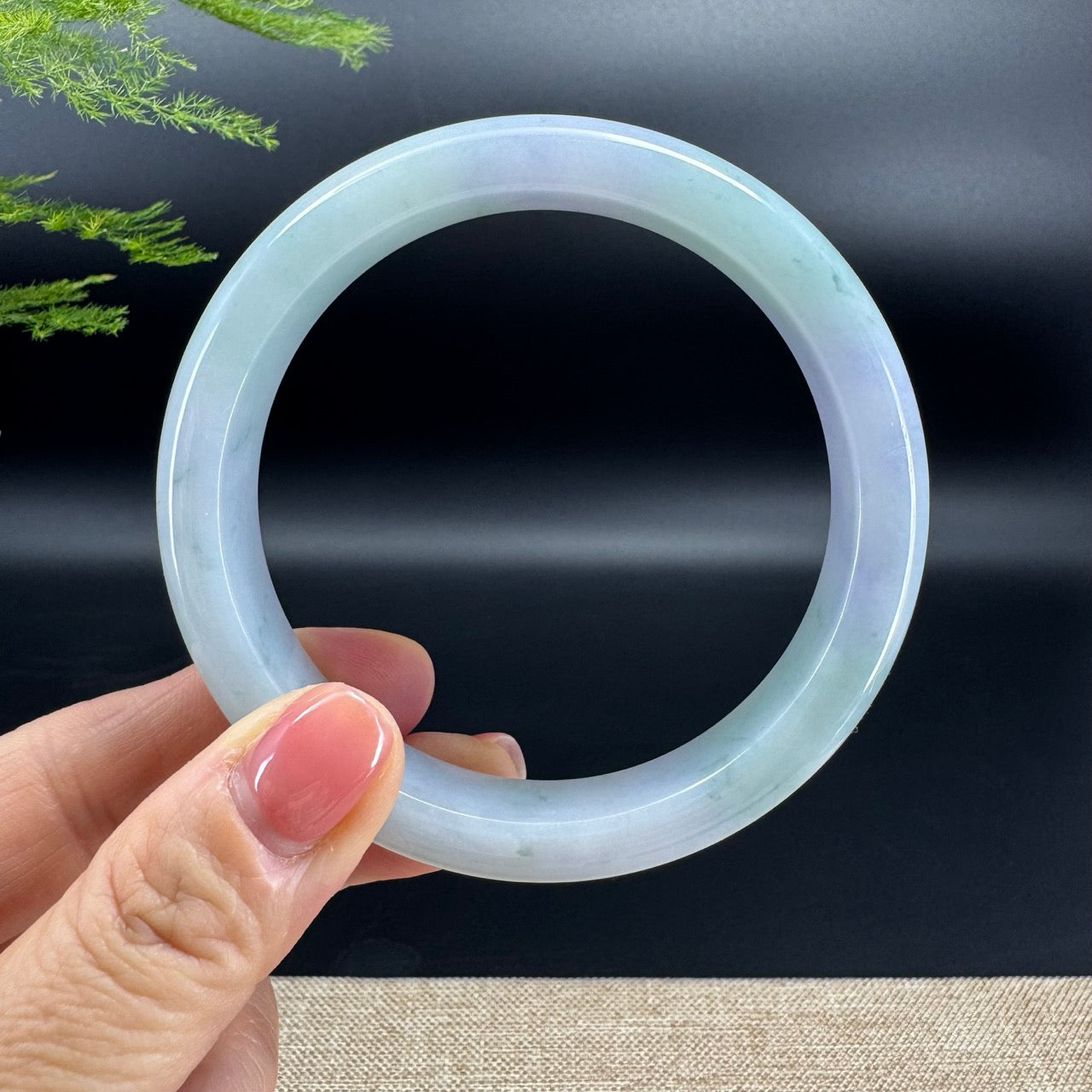 The bangle shape of the half round.The bangle color is lavender green flower.