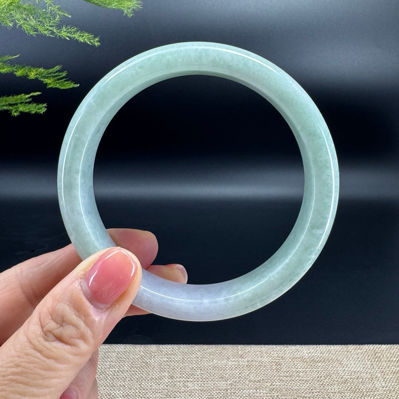 The bangle shape of the half round.The bangle color is lavender green.