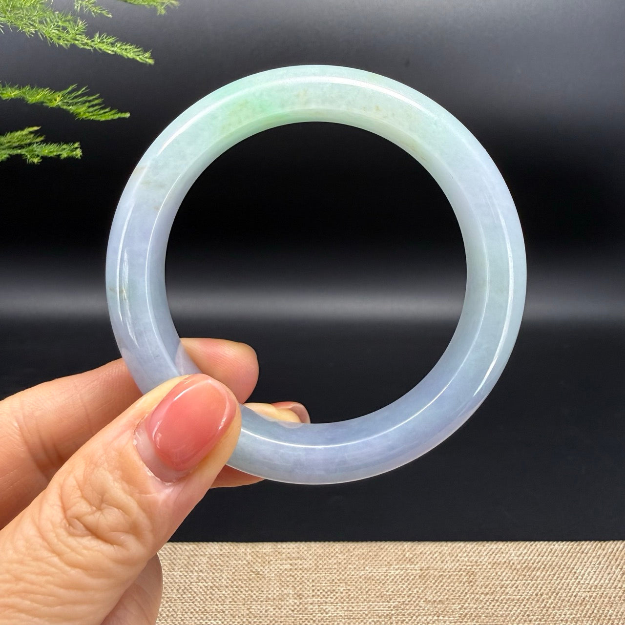 The bangle shape of the half round.The bangle color is lavender green.