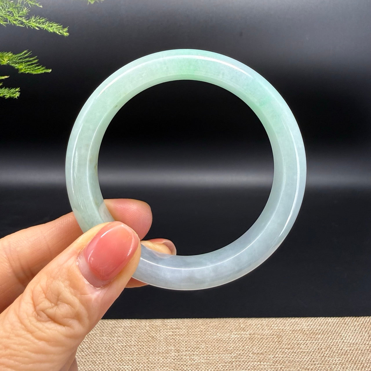 The bangle shape of the half round.The bangle color is lavender green.