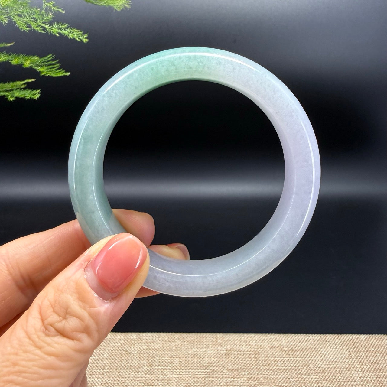 The bangle shape of the half round.The bangle color is lavender green.