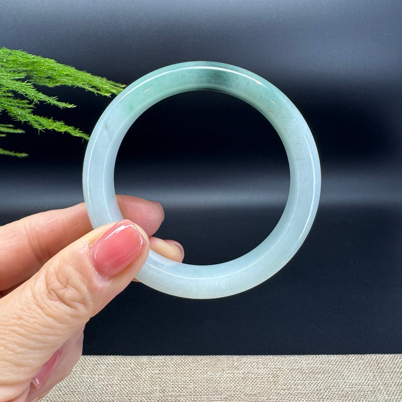 The bangle shape of the half round.The bangle color is white forest green.