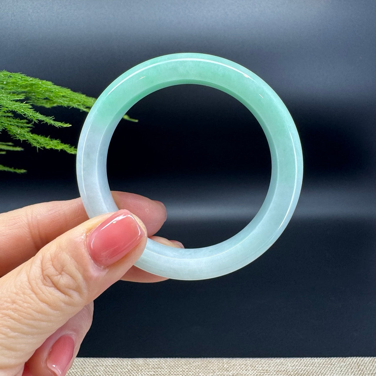 The bangle shape of the half round.The bangle color is lavender green.