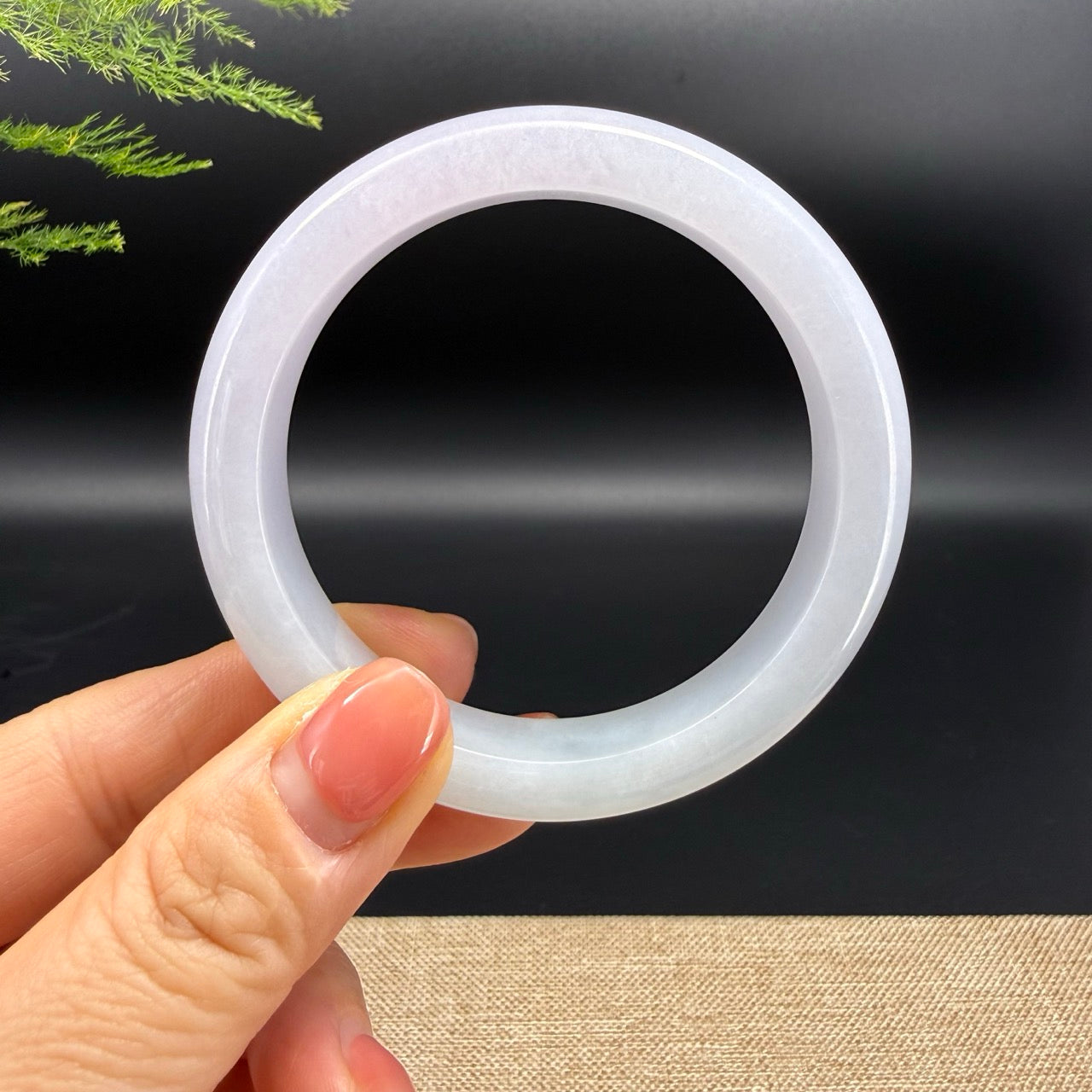 The bangle shape of the half round.The bangle color is light lavender.