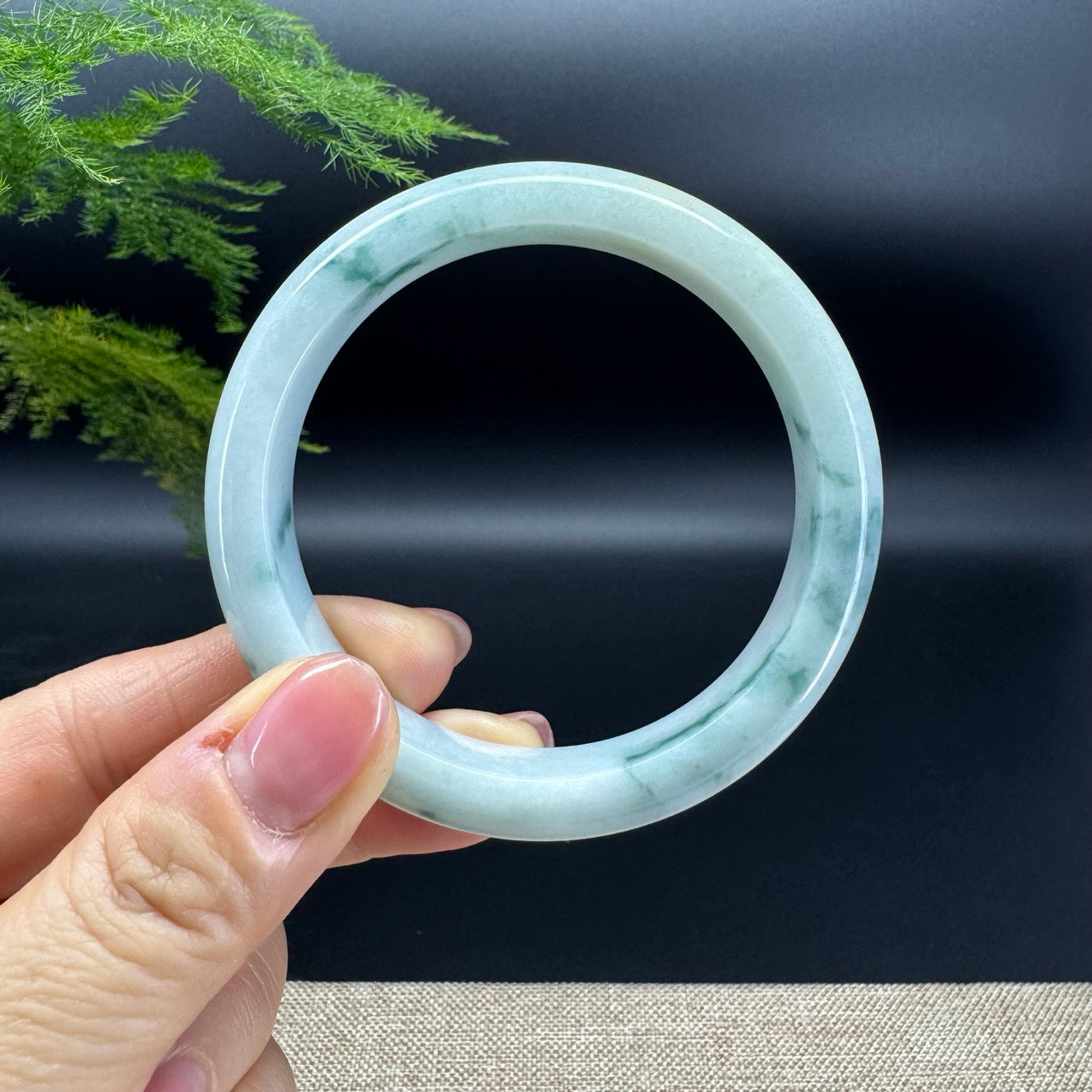The bangle shape of the half round.The bangle color is icy blue flower  green and a bit of yellow.