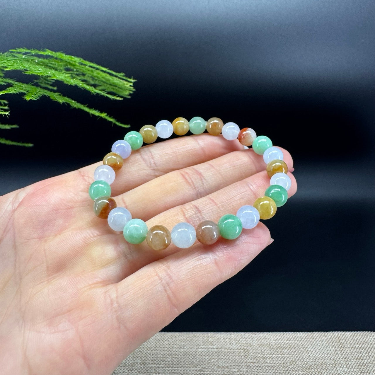 The beads bracelets shape of the round,and the color are multicolor.