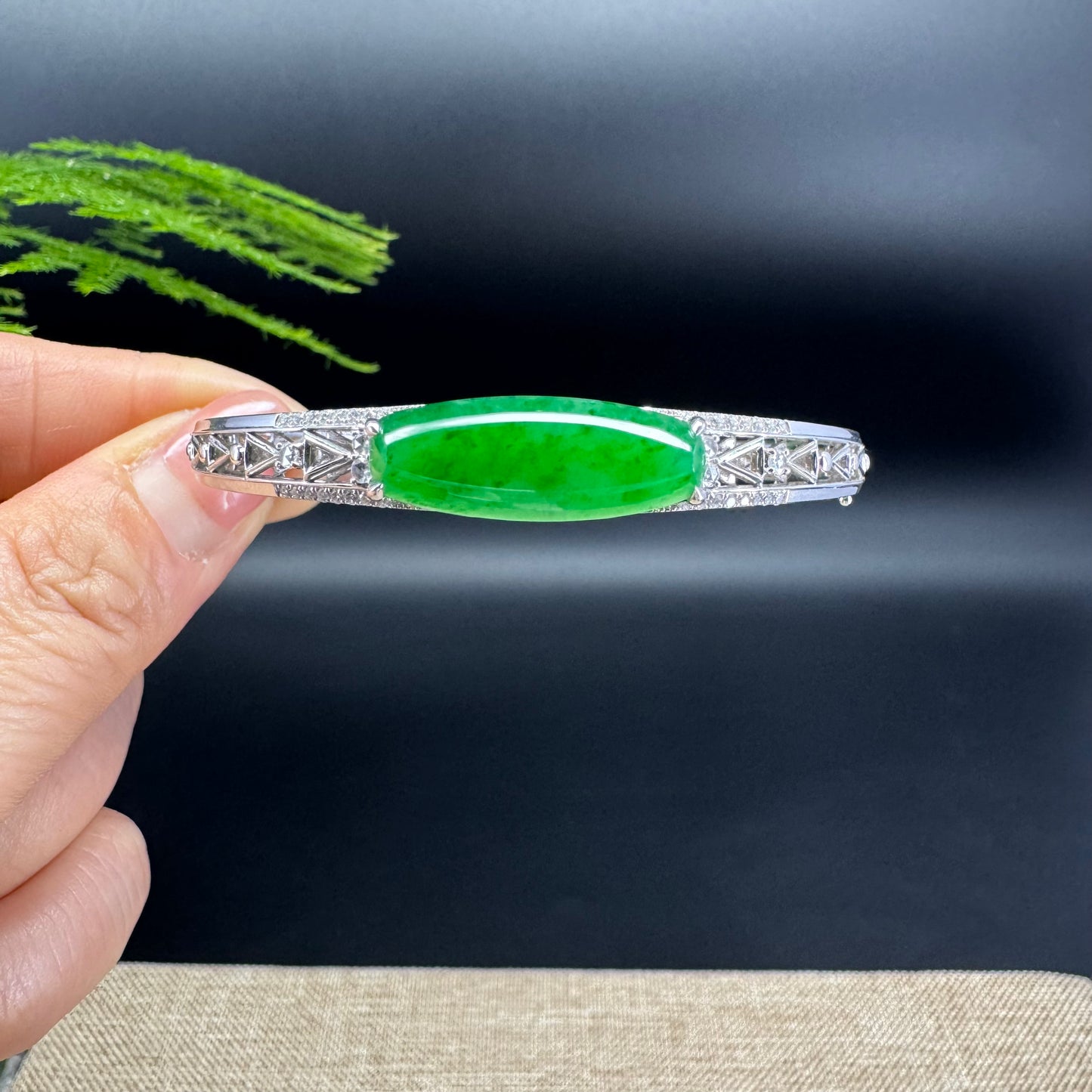 This bracelet blends the rich imperial green tones. Made from one of the rarest jades in the world, it offers a perfect mix of elegance and everyday style.