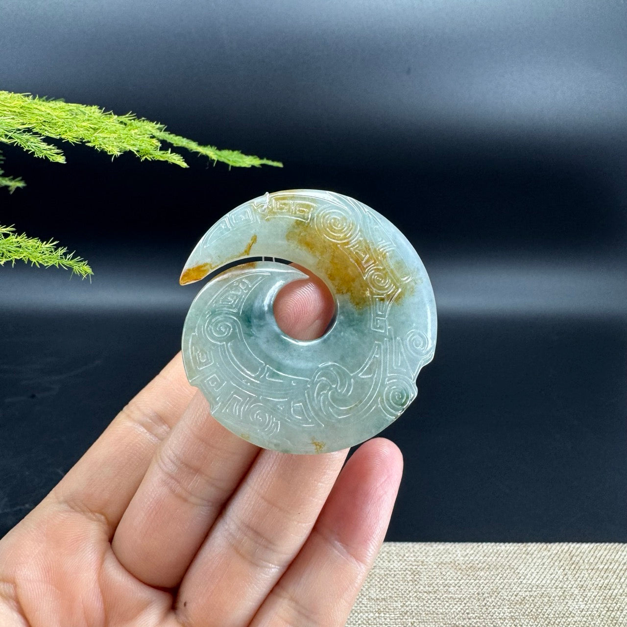 The jade color is blue-green and some sajin.It also called "Fortune Turns"