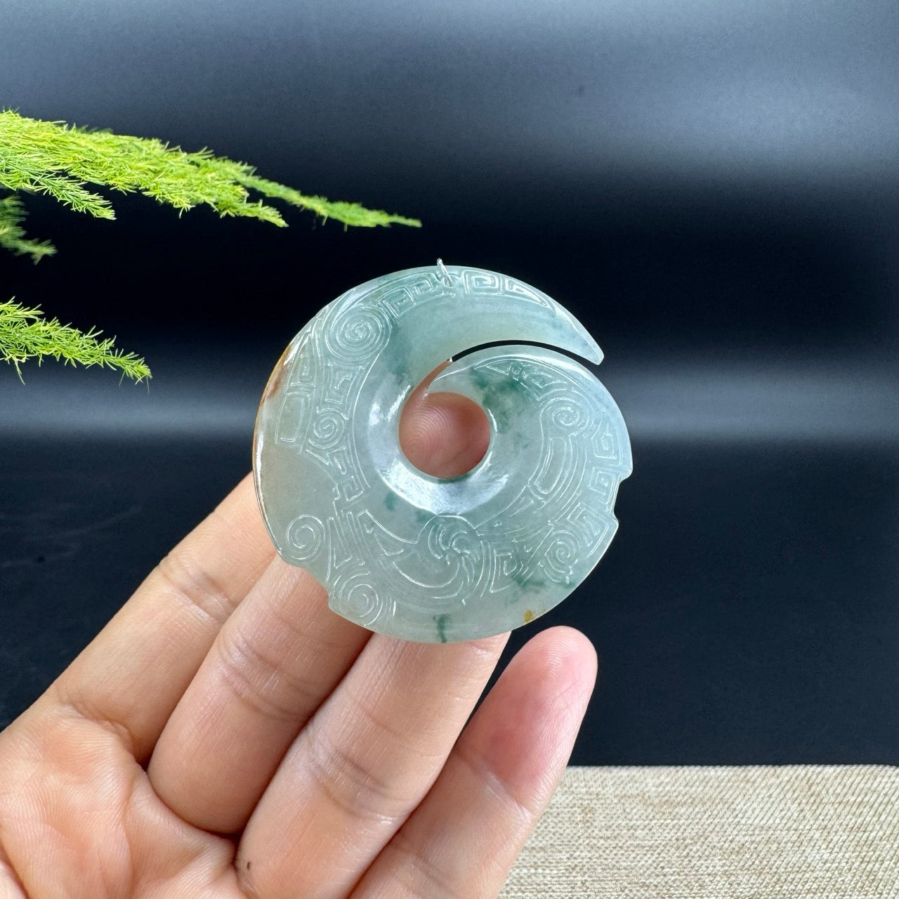 The jade color is blue-green and some sajin.It also called "Fortune Turns"