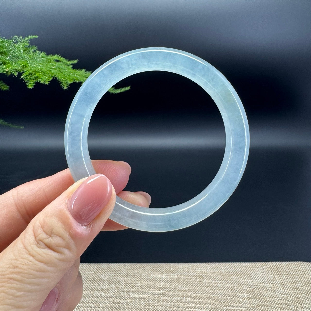 The bangle shape of the half round.The bangle color is icy.