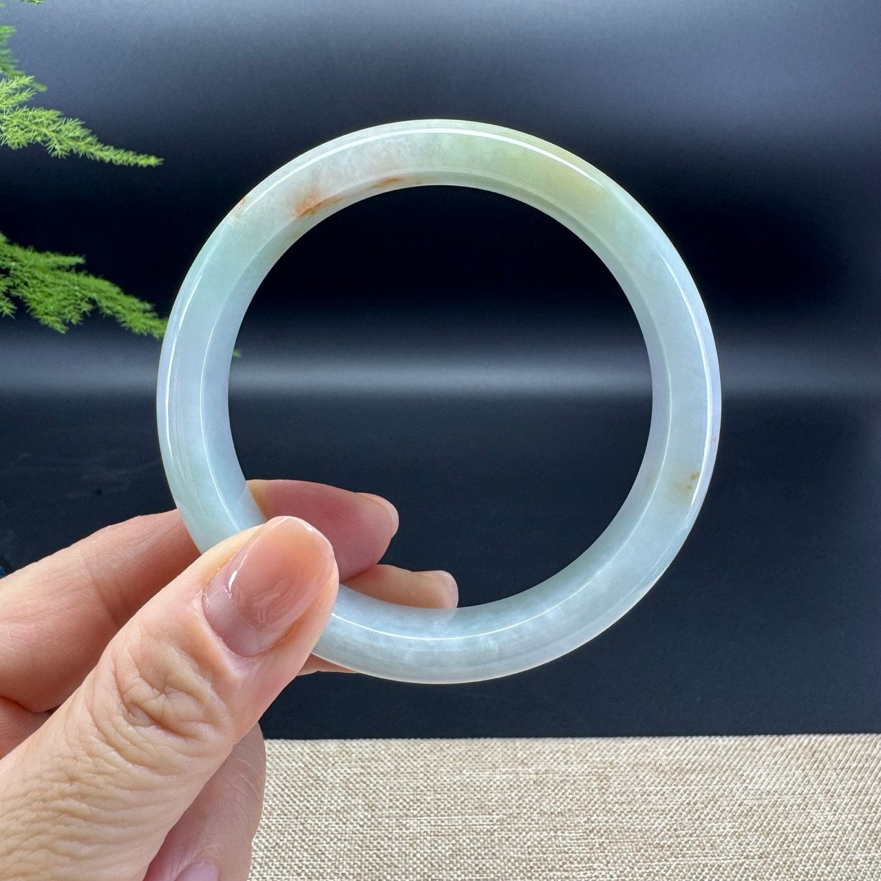 The bangle shape of the half round.The bangle colors are lavender green and a little of sajin.