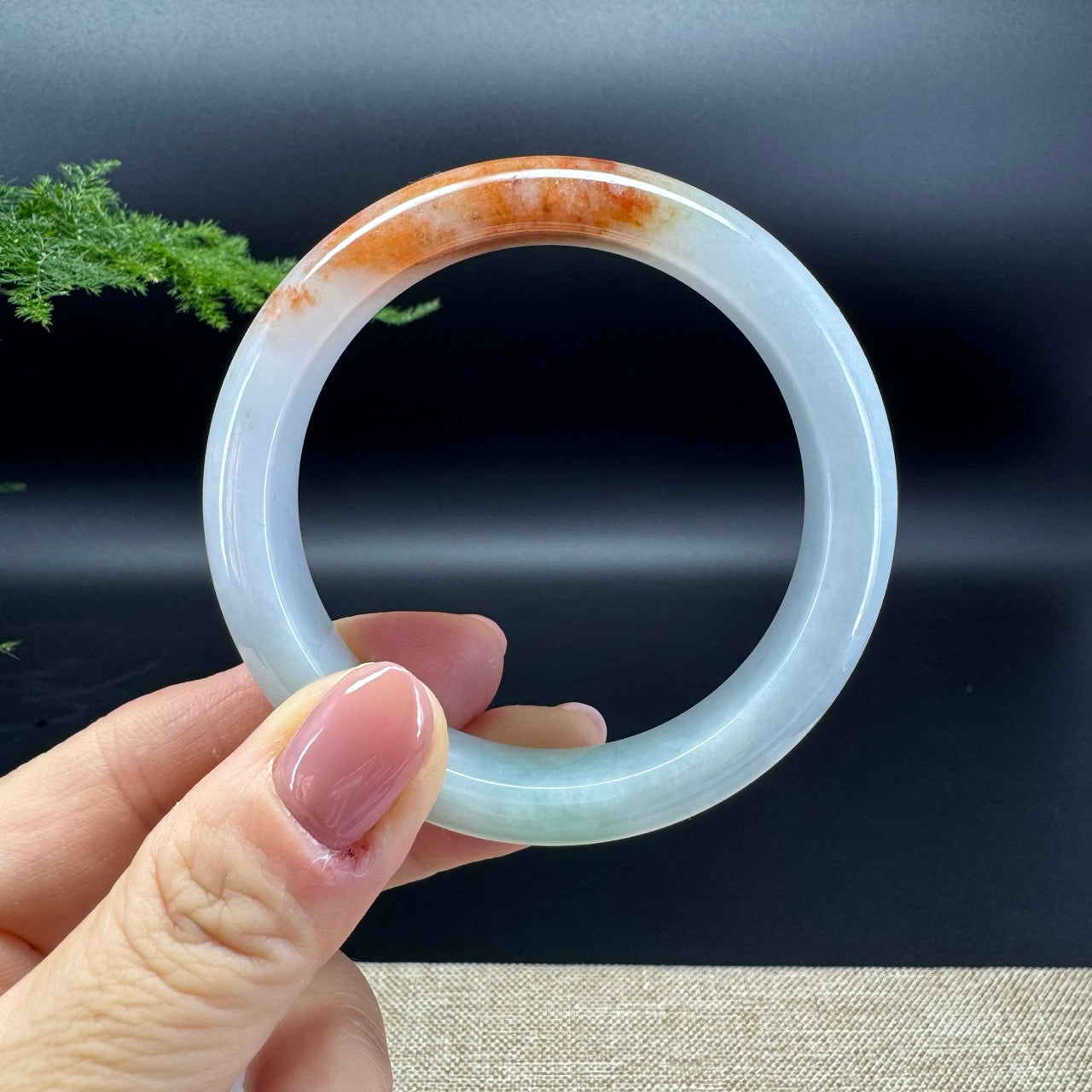 The bangle shape of the half round.The bangle are multiple-colors.