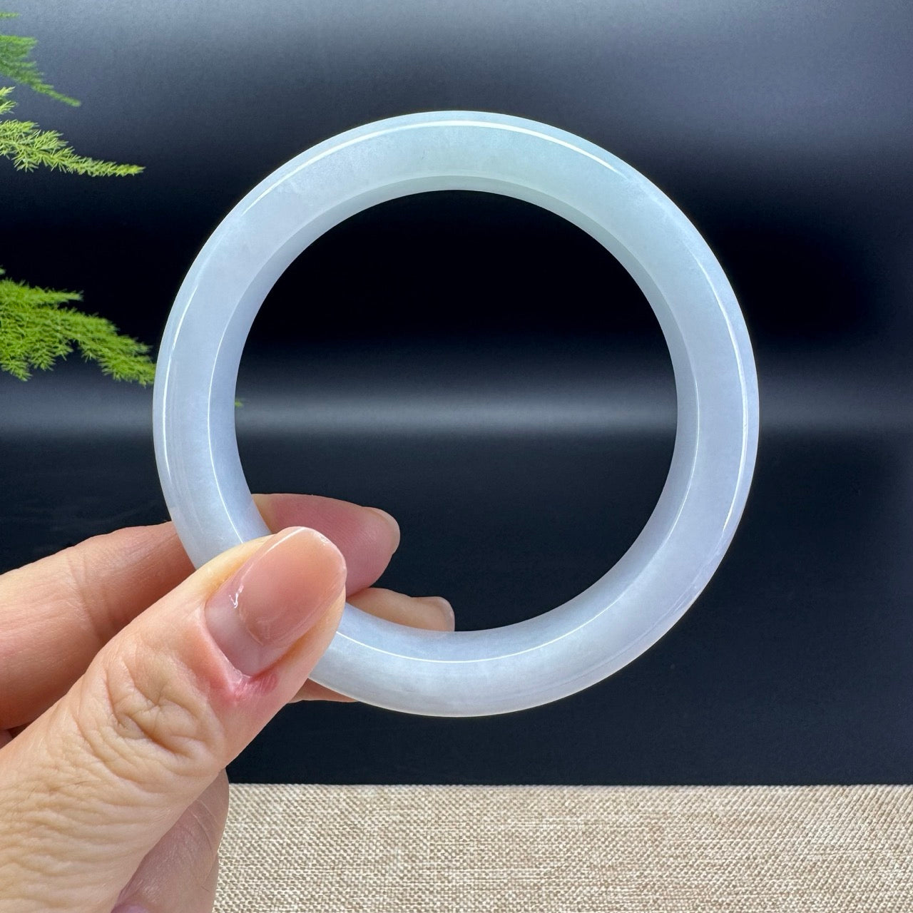 The bangle shape of the half round.The bangle color is lavender green.