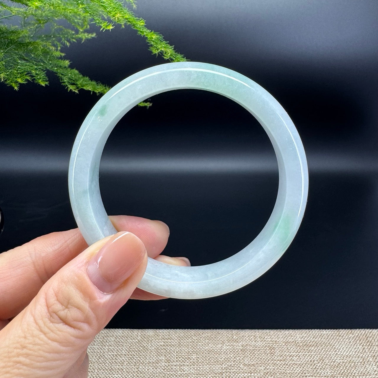The bangle shape of the half round .The bangle color is icy green.