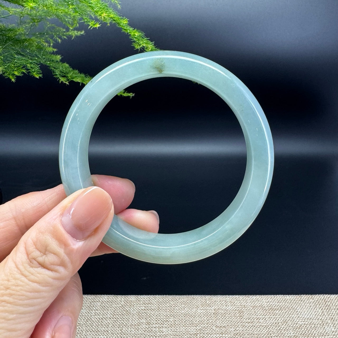 The bangle shape of the half round.The bangle color is apple green