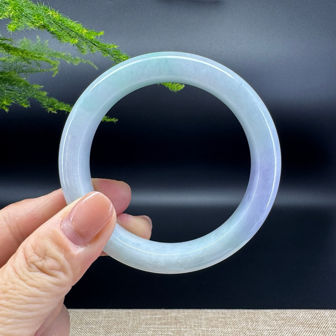 The bangle shape of the half round.The bangle color is lavender green.