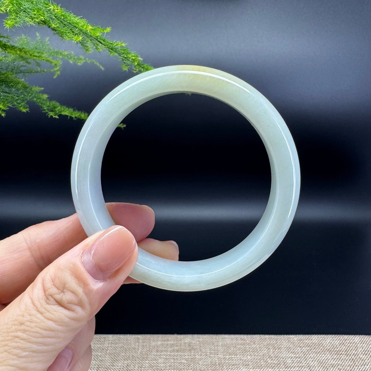 The bangle shape of the half round.The bangle color is yellow green.