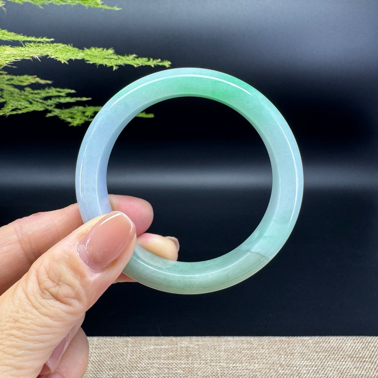 The bangle shape of the half round.The bangle color is lavender green.