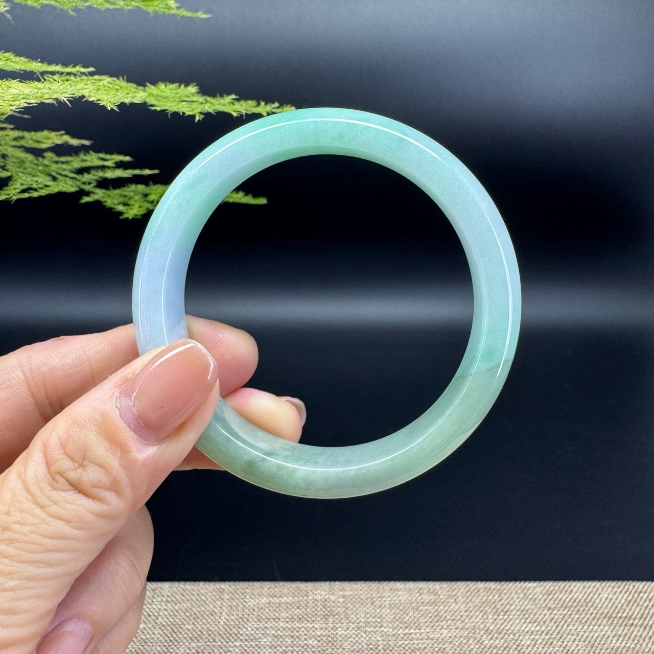 The bangle shape of the half round.The bangle color is lavender green.