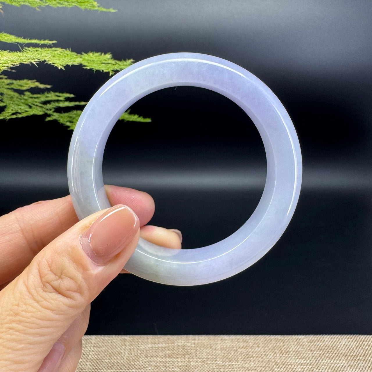 The bangle shape of the half round.The bangle color is lavender green.