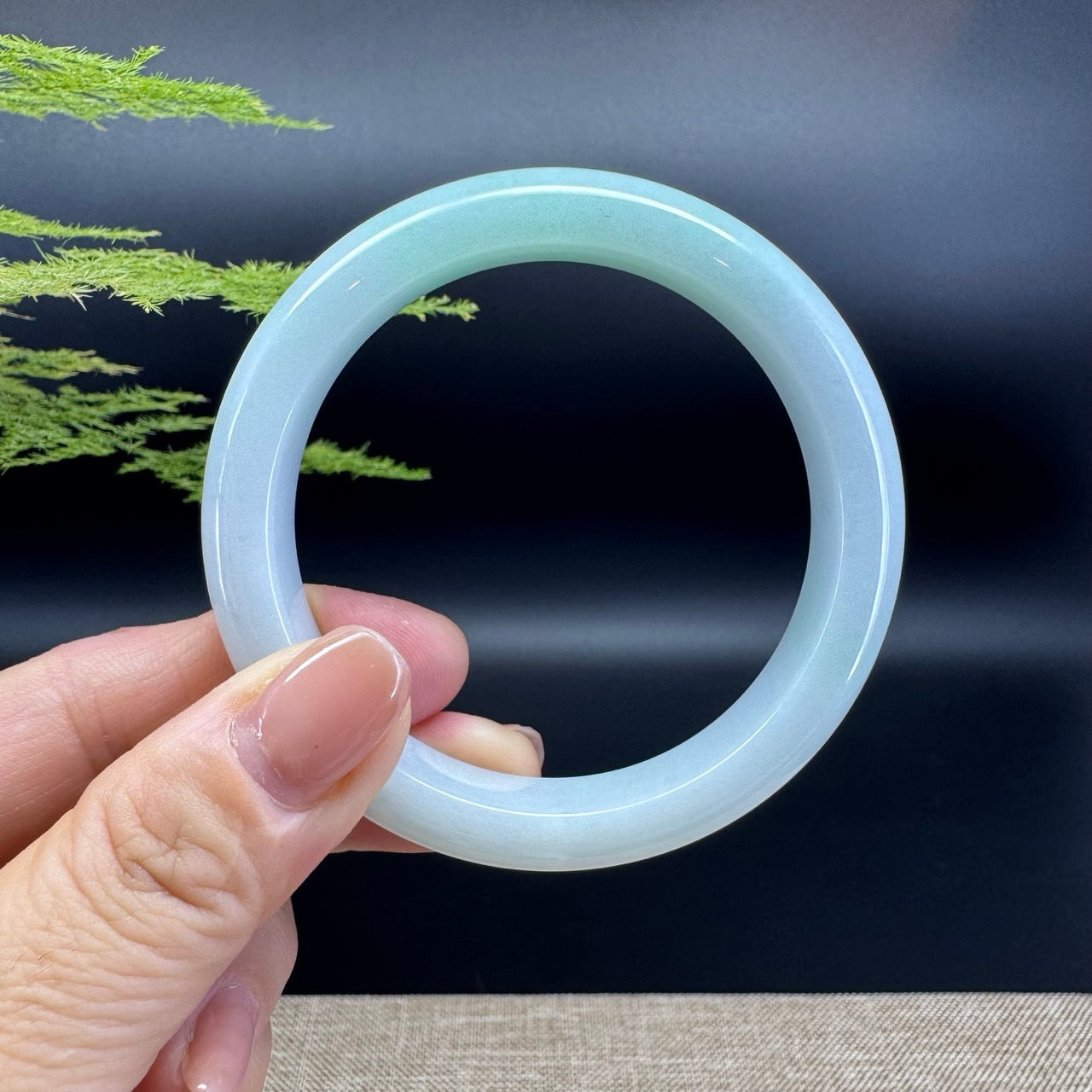 The bangle shape of the half round.The bangle color is lavender green.