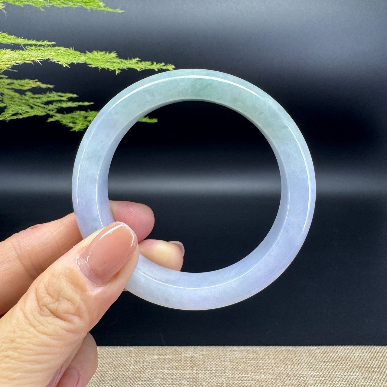 The bangle shape of the half round.The bangle color is lavender green.