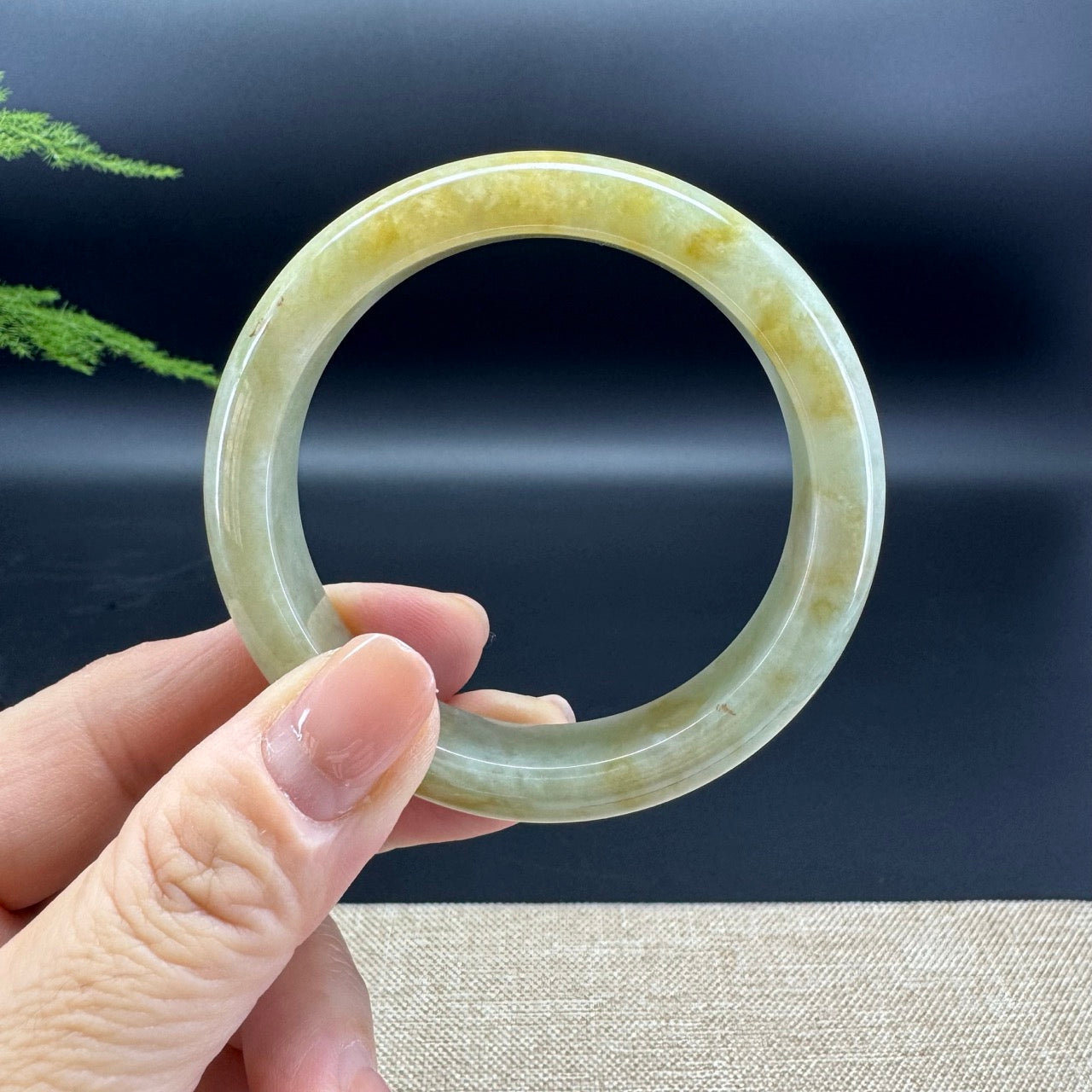 The bangle shape of the half round.The bangle color is yellow.