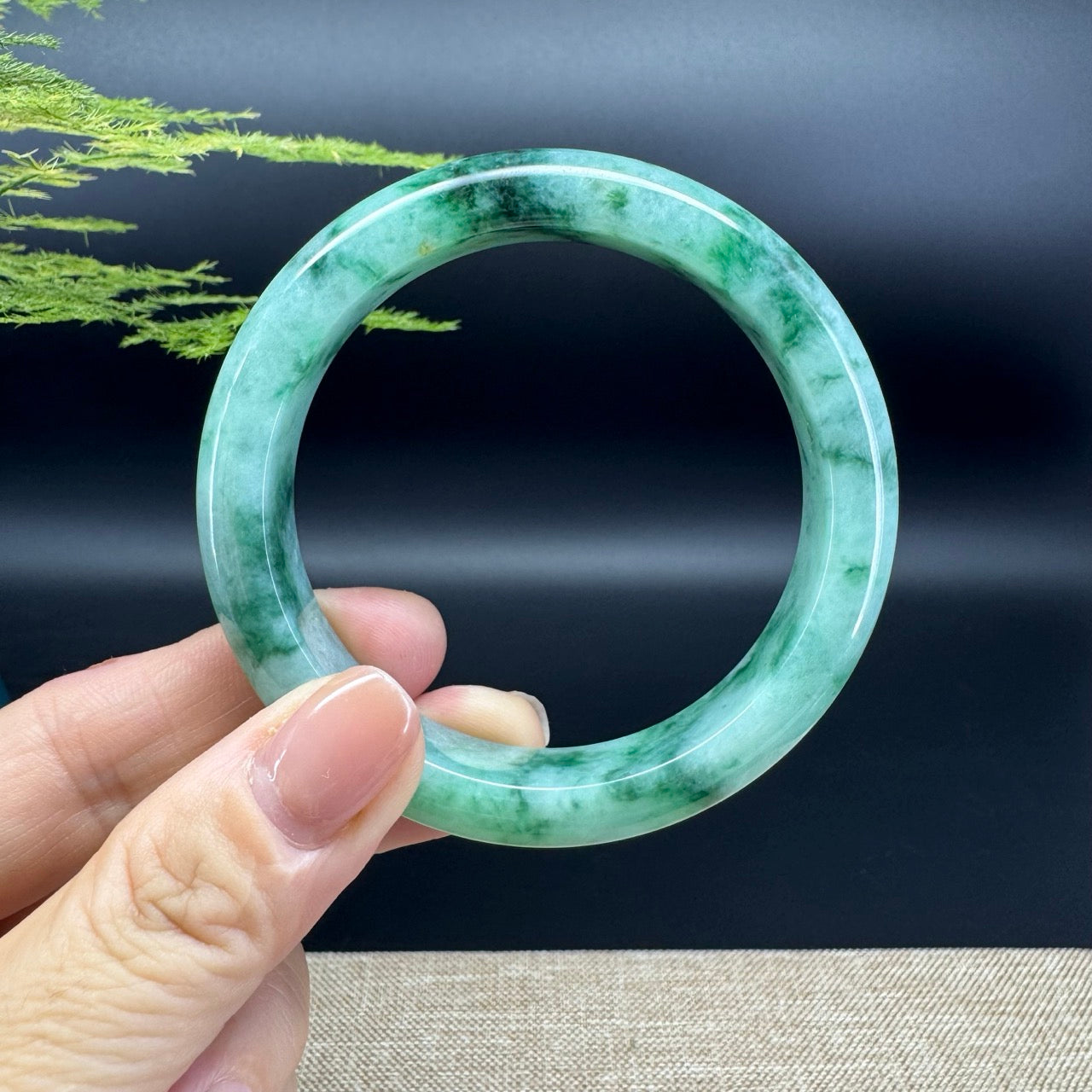 The bangle shape of the half round.The bangle color is oil green.