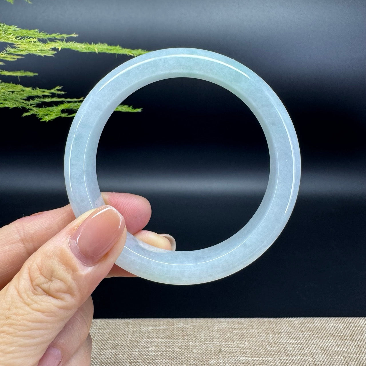 The bangle shape of the half round.The bangle color is lavender green.