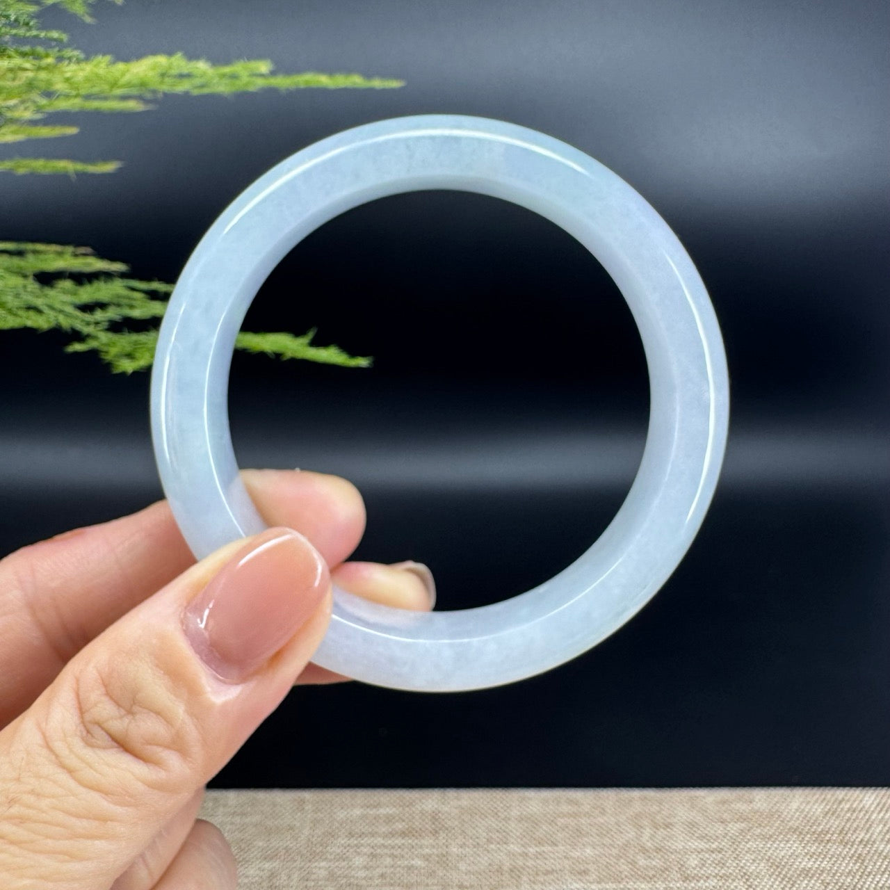 The bangle shape of the half round.The bangle color is icy lavender.