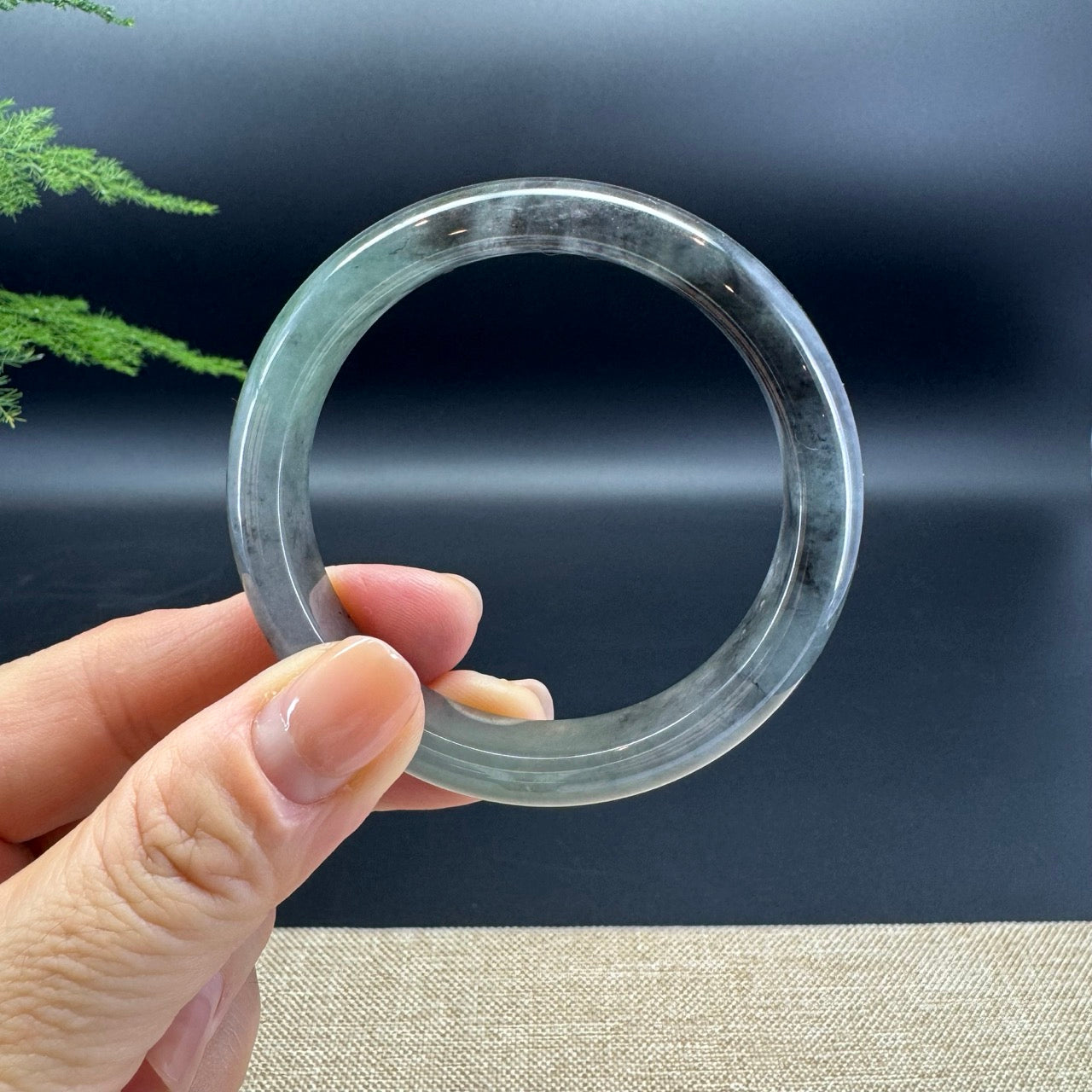 The bangle shape of the half round.The bangle color is icy green black wuji.