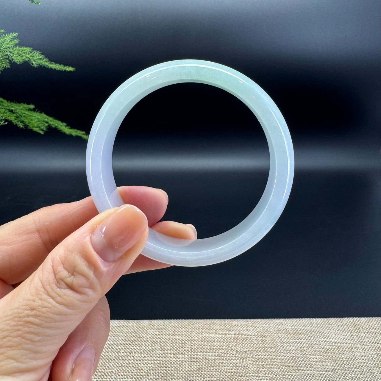 The bangle shape of the half round.The bangle color is lavender green.