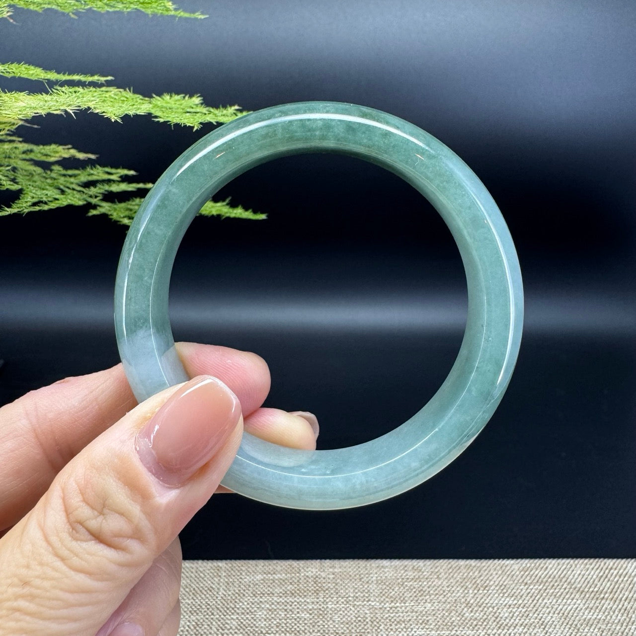 The bangle shape of the half round.The bangle color is lavender green.