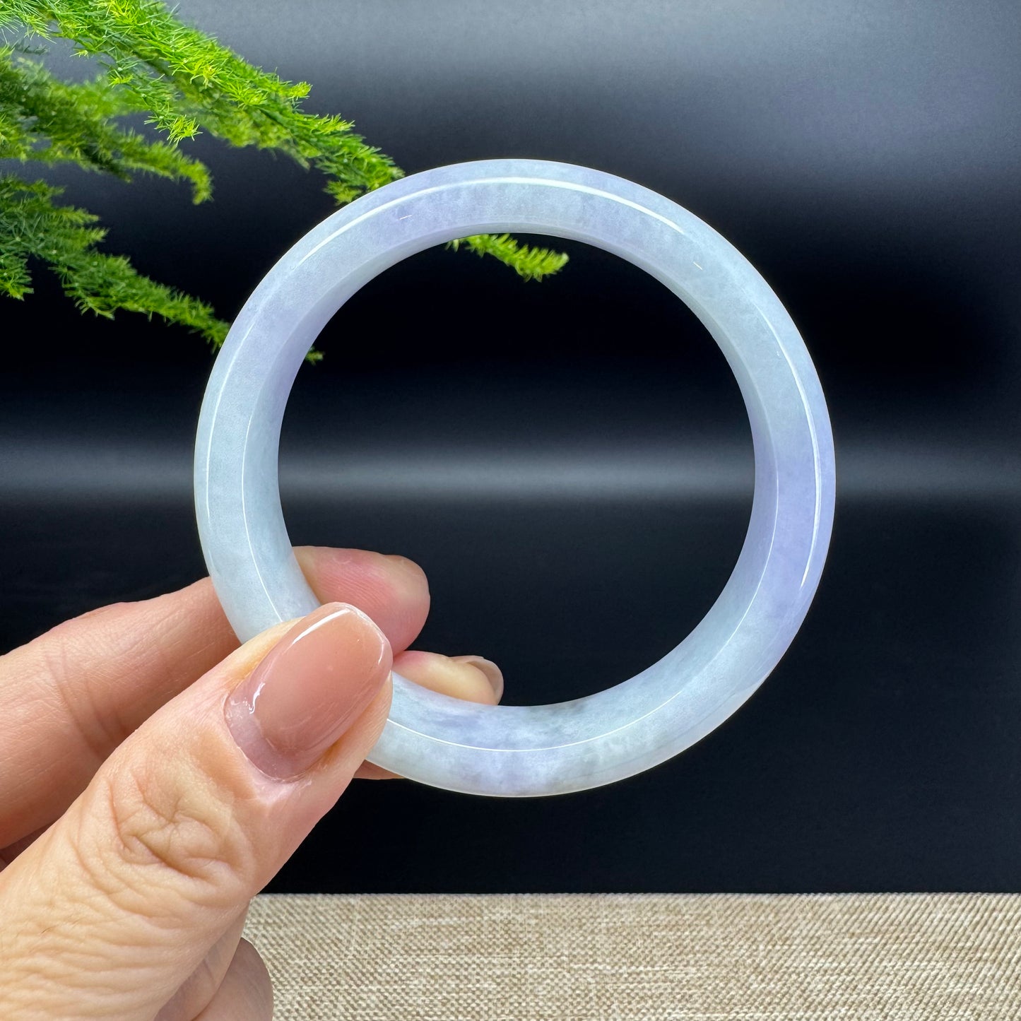 The bangle shape of the half round.The bangle color is icy lavender.