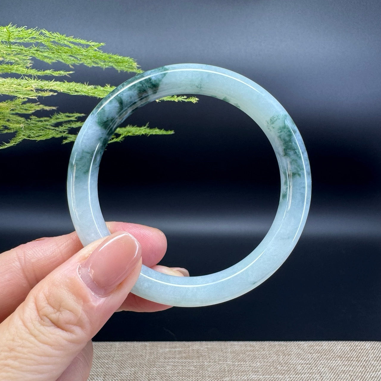 The bangle shape of the round.The bangle color is icy blue .