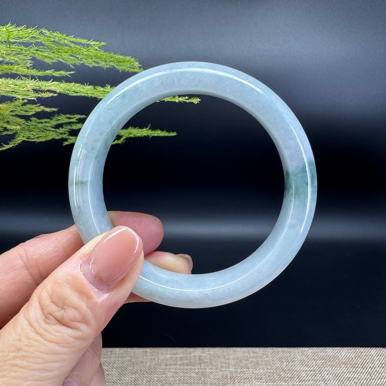 The bangle shape of the half round.The bange color is icy green.