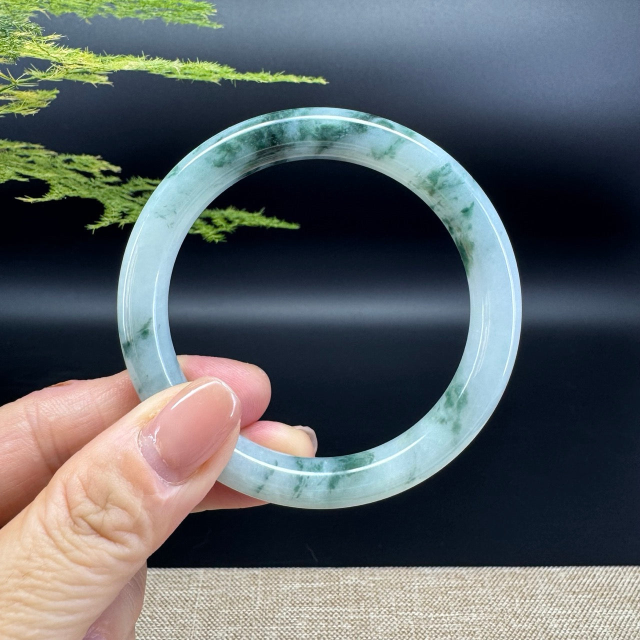 The bangle shape of the half round.The bangle color is icy blue flower.
