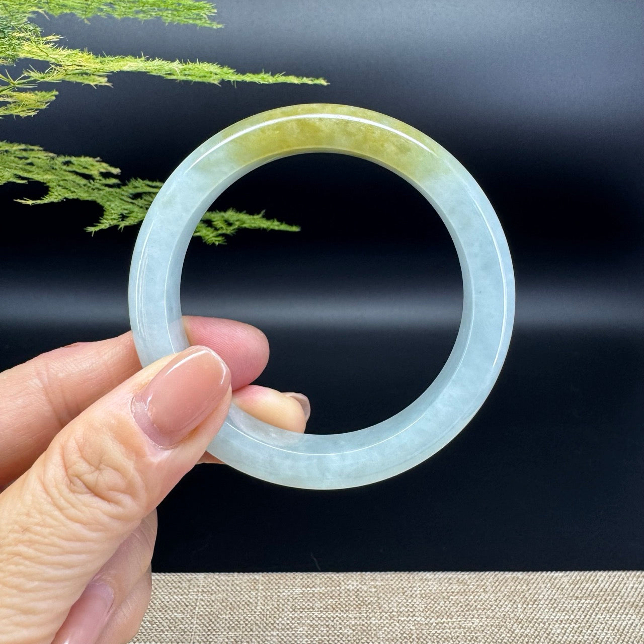The bangle shape of the half round.The bangle color is yellow green.