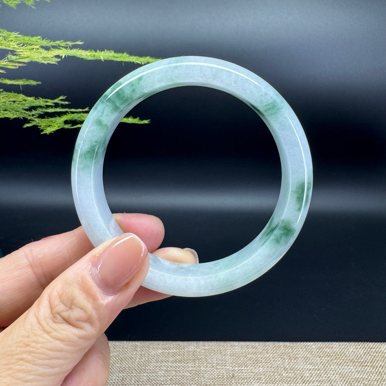The bangle shape of half round.The bangle color is icy blue flower.