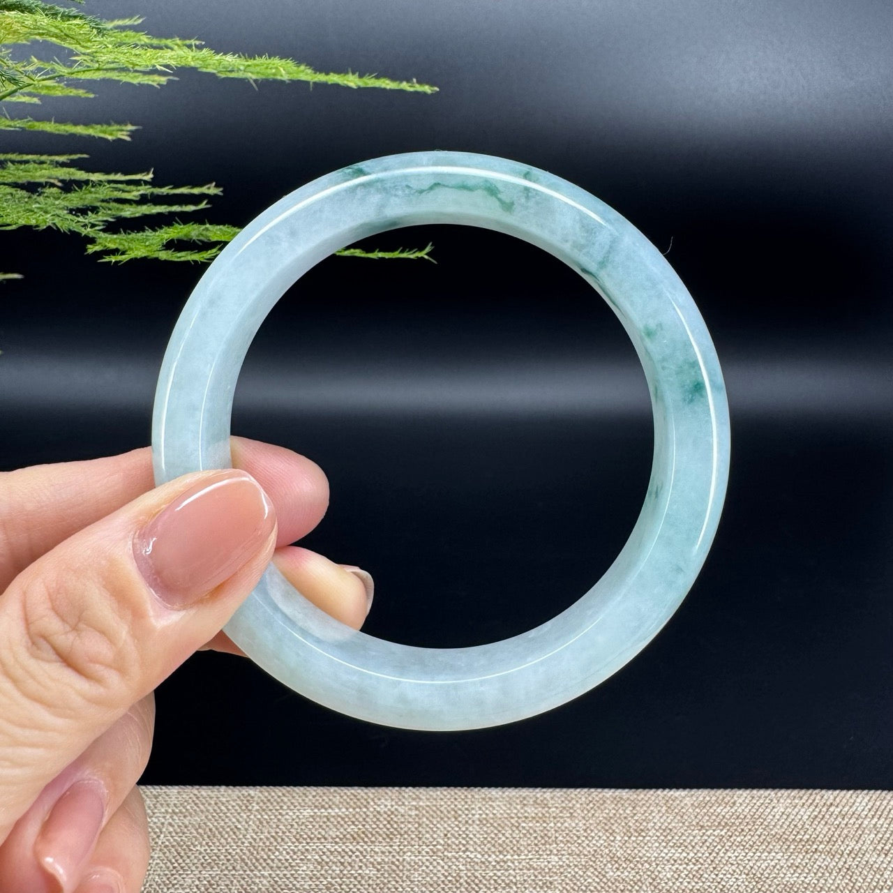 The bangle shape of the half round.The bangle color is icy green flower.